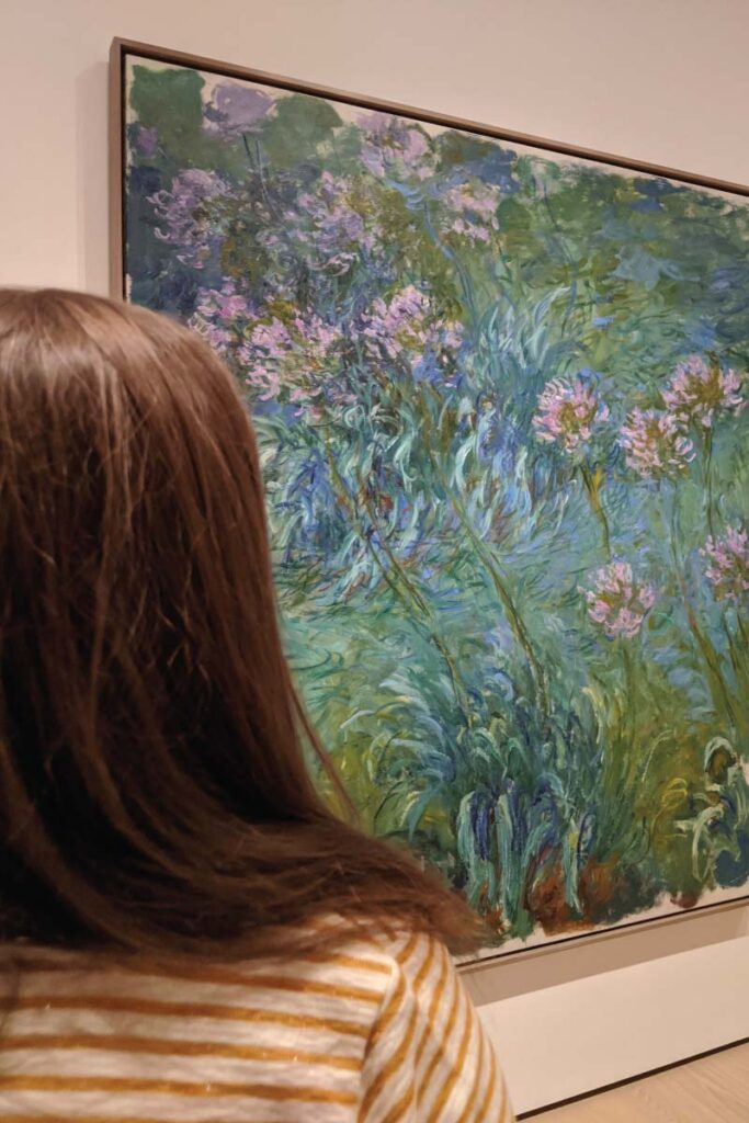 Hannah in front of Monet's "Agapanthus" at the MoMA